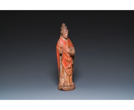 Full title: A polychromed walnut sculpture of Pope Nicholas V, Northern France, 15th C.Description:H.: 52 cm Depicted standin