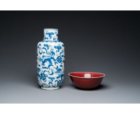 Full title: A Chinese blue and white 'Buddhist lions' vase and a 'langyao' bowl, 19/20th C.Description:H.: 38 cm (the vase)Di