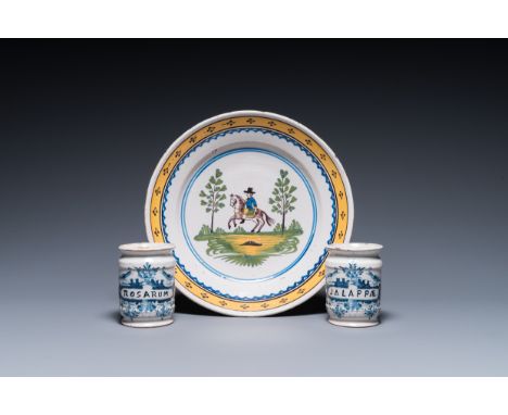 Full title: Two Dutch Delft blue and white drug jars and a polychrome Brussels faience dish with a rider on horseback, 18th C