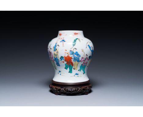 Full title: A Chinese famille rose 'playing boys' vase on a fine carved wooden stand, YongzhengDescription:H.: 27 cm (incl. t