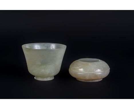 Chinese Art Two white jade objects: a round box and a cup China, 19th century . . Cm 7,00 x 5,50.