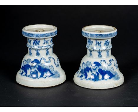 Chinese Art A pair of incense stick holders China, Qing, 17th century. . Cm 9,00 x 10,00. Blue&amp;white porcelain spool-shap