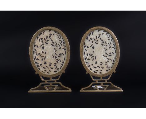 Chinese Art A pair of brass and jade bookends for the European market China, 20th century . . Cm 10,50 x 16,50.