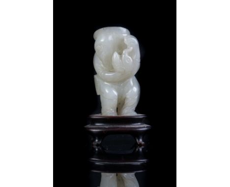 Chinese Art A white jade figure of a scholar China, Qing dynasty, 19th century. . Cm 5,50.