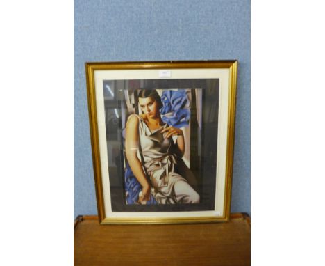 A Tamara de Lempicka print, framed