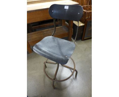 A vintage Tan Sad industrial machinist's chair