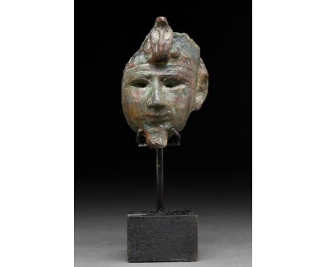 Late Period, Ca. 664-332 BC The head in the image of a king with fragment of white crown of Upper Egypt, decorated with Uraeu