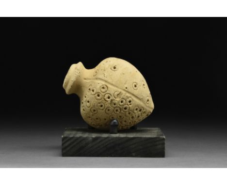 Ca. 800-1000 AD  A ceramic grenade, also referred to as "Greek Fire". This hollow ceramic vessel is with a piriform body, a s