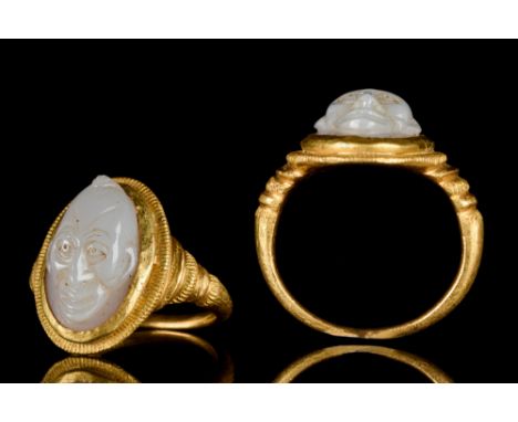 Ca. 100-200 AD  A gold finger ring composed of a round hoop, flat inside and rounded on the outside, with decorative vertical