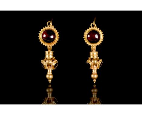 Ca. 100-300 AD  An elaborate pair of gold earrings each comprising (from top to bottom): faux woven hoops from which close at