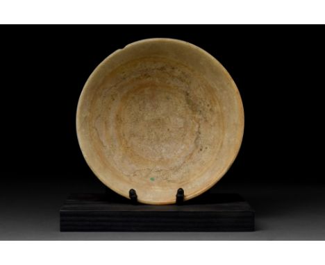 Old Kingdom, Ca 2686-2160 BC  A skillfully carved alabaster bowl, featuring a hemispherical body with walls flaring outwards,