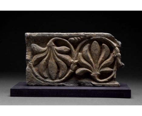 Ca. 200-300 AD  A schist stone frieze embellished with a beautifully carved scroll of vegetal motif. Gandhara was an ancient 