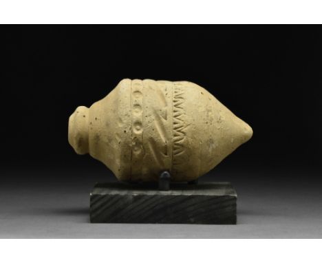 Ca. 800-1000 AD  A ceramic grenade also referred to as 'Greek Fire'. This hollow ceramic vessel features an elongated barrel-