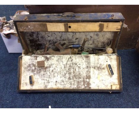 A large blue toolbox with metal clasps, containing workman's tools, together with another pine toolbox with tools.
