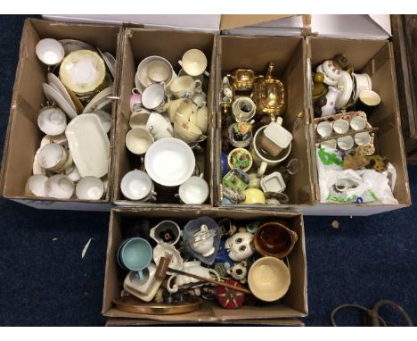 Five small boxes of household items including China tea sets, coloured glass items, ceramic items and wooden souvenirs.