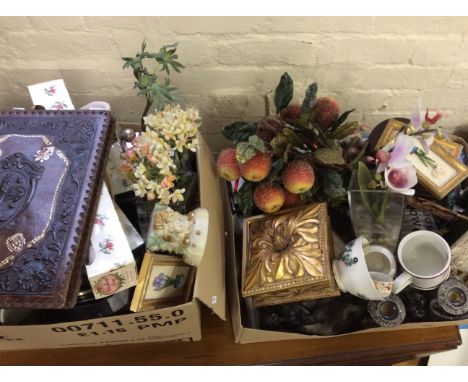 Two boxes of various items including a mirror with candle stick, a Wedgwood Charles Dickens centenary mug, a leather bound ph
