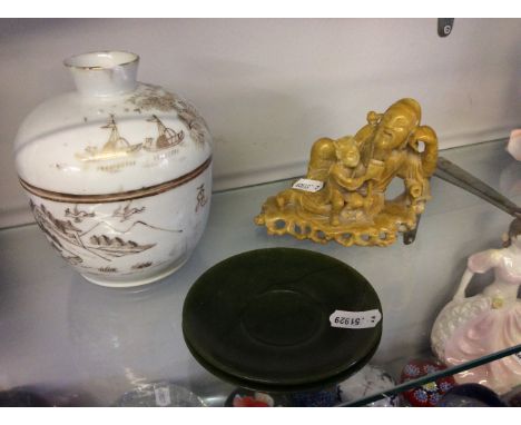 Two jade saucers, a soapstone figure and Chinese lidded pot.