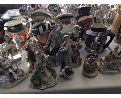 Ten ceramic figurines, four musicians, two shepherds and one ceramic wall hanging.