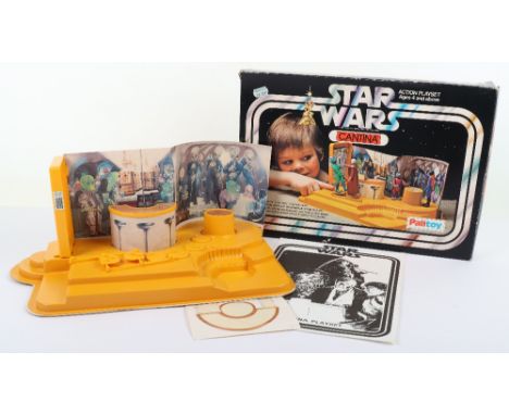 Boxed Palitoy Vintage Star Wars Cantina Action Playset, complete contents: play-base with swing doors, circular bar, chipboar