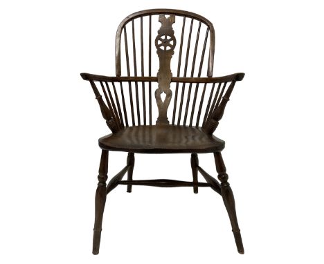 19th century elm and ash Windsor chair, high stick back with pierced wheel beech splat, raised on turned supports united by H