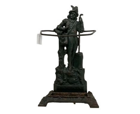 Victorian cast iron stick or umbrella stand, figure of Dick Whittington back, inset drip tray registration number to the reve