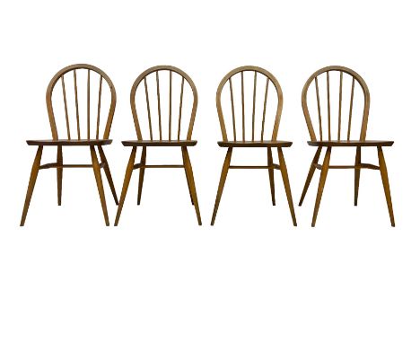 Ercol - set four elm and beech 'Windsor Dining Chairs', hoop stick back over splayed and tapered supports united by H-stretch