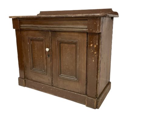 Victorian scumbled pine standing cupboard, raised back over rectangular top with rounded corners, fitted with two panelled do