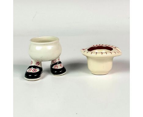 Includes a ceramic footed character egg cup with comical feet. Also includes a salt cellar with hand drawn eye. Vintage hand 