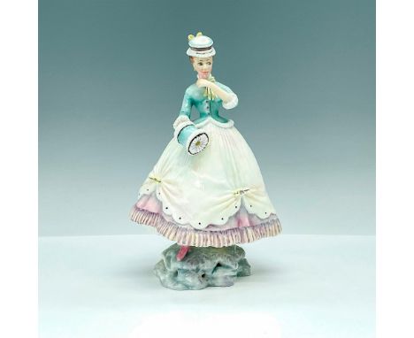 This gorgeous figurine of Lisette in a charming pastel dress with a full skirt and adorned with delicate ribbons. It was part