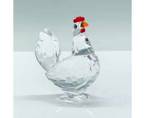 Part of The Peaceful Countryside theme group. A mini clear crystal hen with light Siam-red comb and topaz beak. Swarovski mar