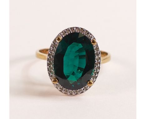 Lab Grown Emerald &amp; Diamond Halo Ring 4.68ct in 375 9ct Gold - Featuring an exquisite oval cut, lab grown emerald, this c