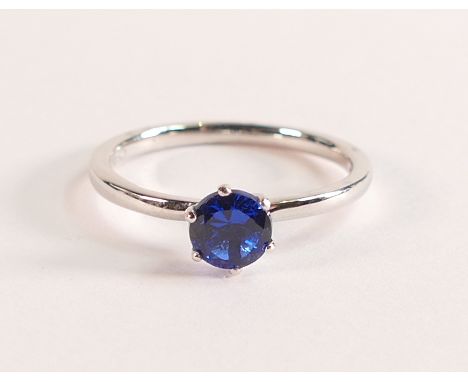 18ct White Gold with Blue Tanzanite ring - 
The 18ct White Gold band is stamped 750.  The vivid blue brilliant cut Tanzanite 