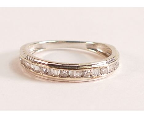 9ct White Gold 0.25ct Diamond Eternity Ring
Hallmarked 375 and stamped 375 0.25
Width of ring 3.13mm
There are nine brilliant