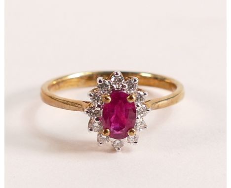 9ct Gold Marquise Cut Ruby and Diamond ring - 
Marquise cut Ruby with a halo of ten Diamonds.  Ruby measures approx 4.23mm by