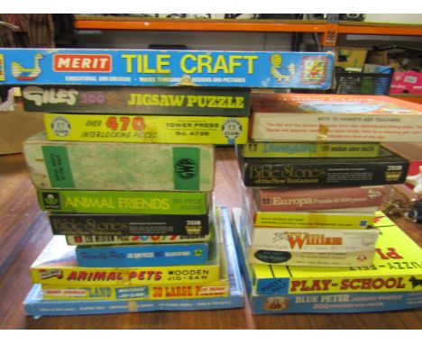 A quantity of vintage puzzles