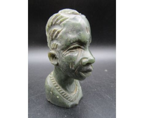 A carved jade? bust 12cmH