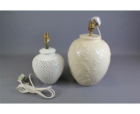 Contemporary Lamp Bases. This lot includes a large ovoid lamp base with leaf decoration, approx 31 cms, a smaller white lamp 