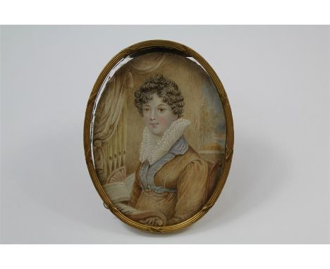 An Antique Portrait Miniature. The oval miniature on ivory, inscribed to verso Miss Carew as painted by Sir John Hayter, appr