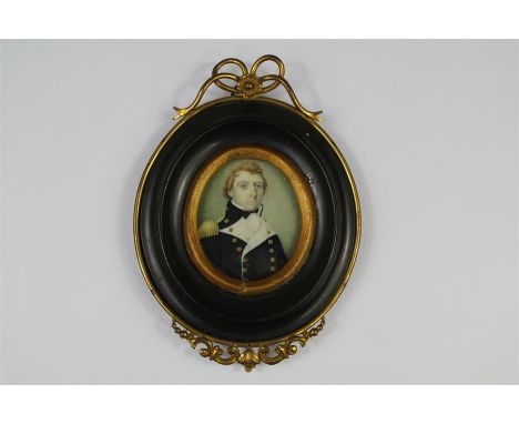 A Late 18th Century Oval Portrait Miniature. The miniature depicting an officer in dress uniform, approx 60 x 53 mm, presente