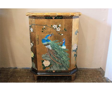 A Chinese Gold-Painted Effect Cabinet. The single cupboard door opens to reveal an internal shelf, the cabinet exterior paint