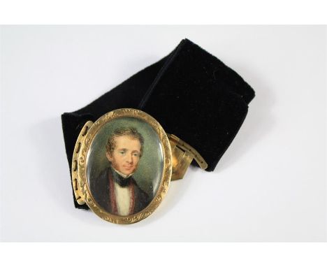 A Fine Victorian Portrait Miniature/Mourning Bracelet. The oval portrait miniature depicting an unknown gentleman woven onto 