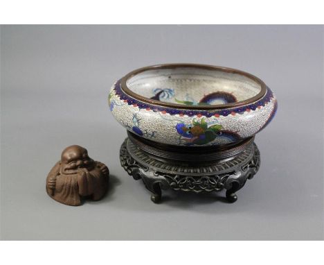 A Chinese 20th Century Cloisonne Bowl. The bowl decorated with a chasing dragon amongst cloud scroll, approx 22 cms d x 5 cms