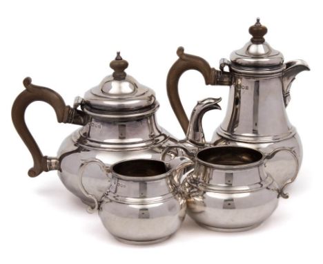 A George VI  silver four-piece tea service, maker C Shapland &amp; Co, London, 1937/39: of squat bulbous outline, with ribbed