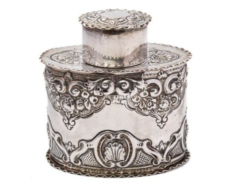 A Victorian silver tea caddy and lid,  maker Josiah Williams &amp; Co, London, 1893: of oval outline, with embossed foliate, 