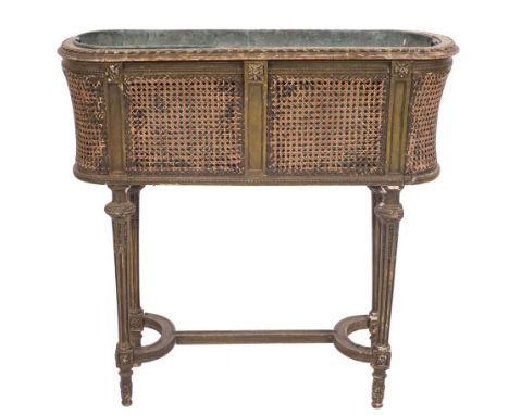 A late 19th century carved giltwood and canework jardiniere: in the French taste of rectangular form with rounded ends, havin