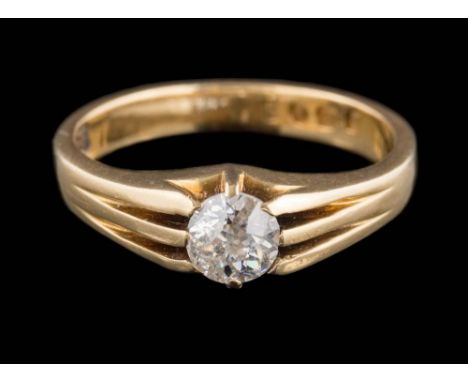 An 18ct gold and diamond claw-set, single-stone ring: the round old brilliant-cut diamond approximately 5.5mm diameter x 3.3m