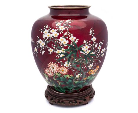 A Japanese silver and cloisonne vase: of ovoid outline, decorated with flowers and blossom to a ginbari red ground, with poli