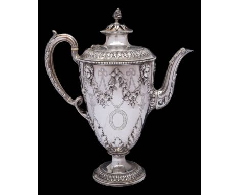 A Victorian silver coffee pot, maker Richard Martin & Ebenezer Hall, Sheffield, 1865: of ovoid form, the domed hinged lid wit