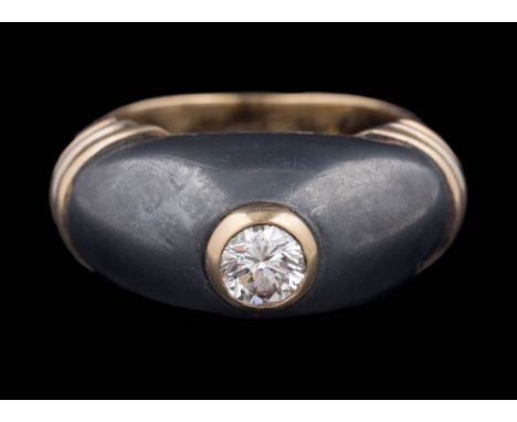 Cartier. A diamond single-stone domed dress ring: the oxidised '800' stamped dome inset with a single diamond approximately 0