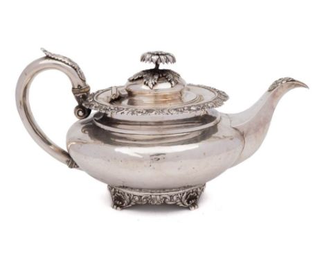 A George IV silver teapot, maker William Bateman, London, 1828: of squat circular form, with foliate decorated border and aca